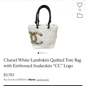 Authentic Chanel white lamb skin quilted tote bag with embossed “CC” logo